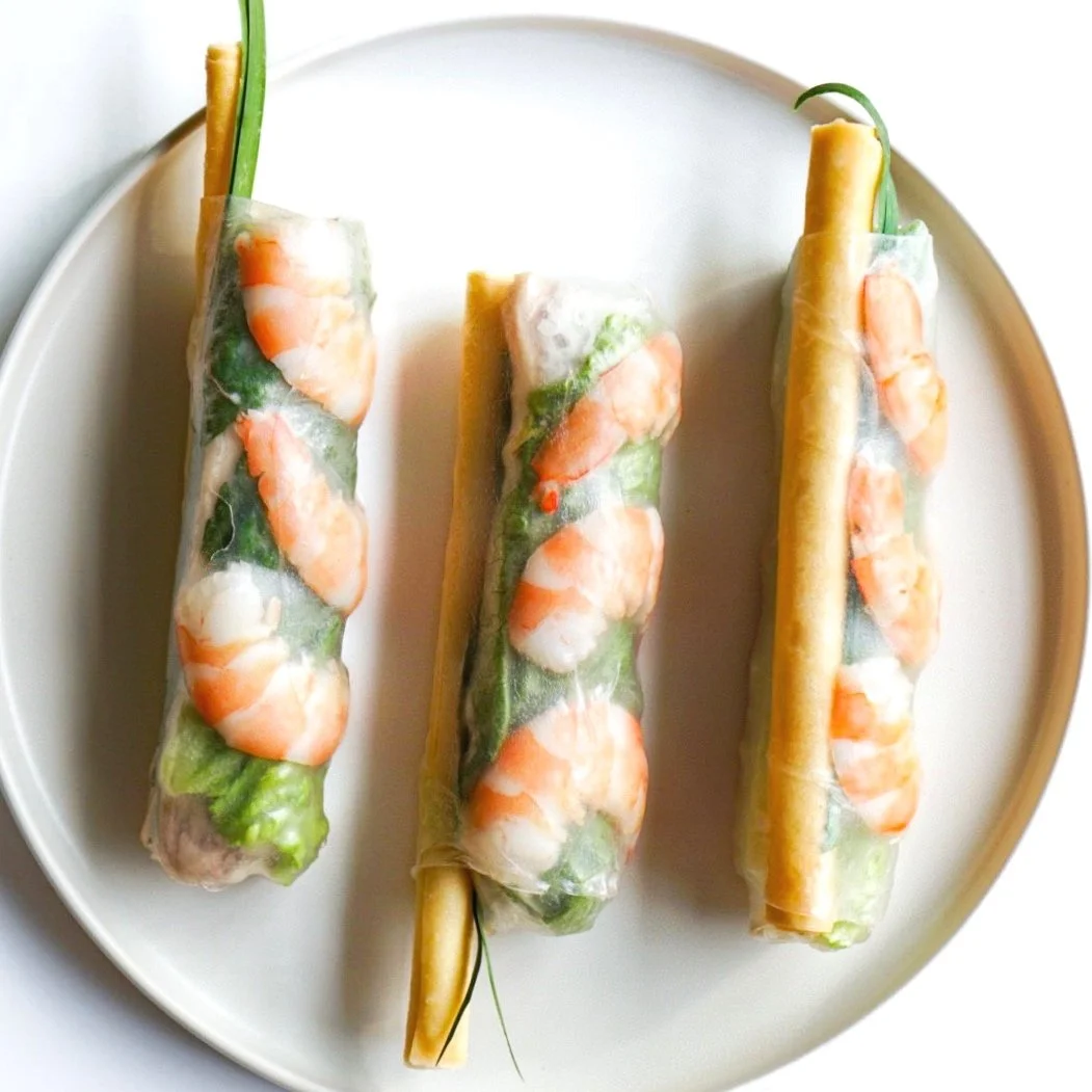 Shrimp spring rolls on a white plate