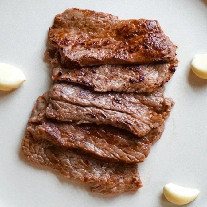 Lemongrass beef, from above in a white dish