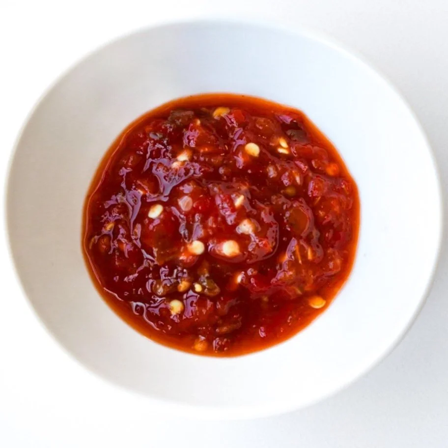 Chili garlic, from above in a white dish